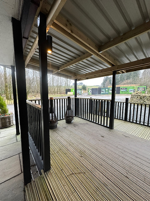 Covered deck with timber beam ceiling